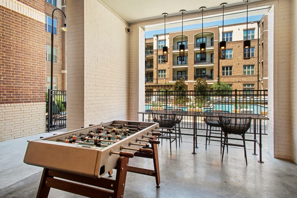 exterior poolside gaming and lounge area